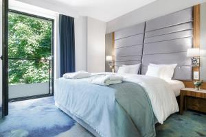 Postel nebo postele na pokoji v ubytování Hotel Testa