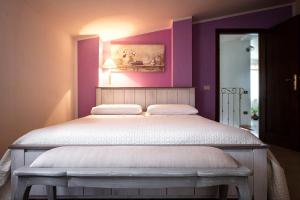 Postel nebo postele na pokoji v ubytování B&B Da Marcella