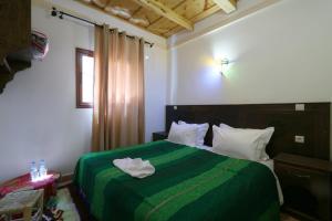 Letto o letti in una camera di DAR ATLAS CHARME