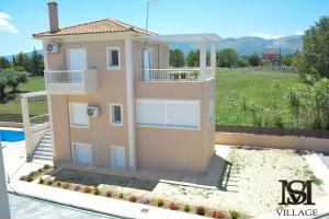 a rendering of a house with a balcony at MS Village in Gaïtánion