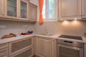 A kitchen or kitchenette at Villa Aziza