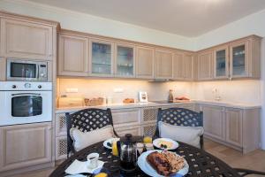 A kitchen or kitchenette at Villa Aziza