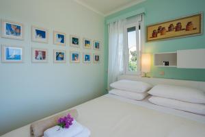 A bed or beds in a room at Villa Aziza