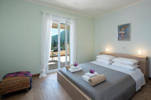 A bed or beds in a room at Villa Aziza