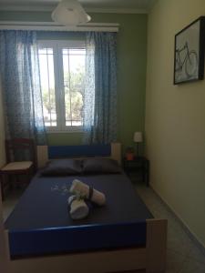 A bed or beds in a room at Monte Caputo Holiday House