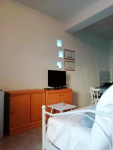 TV a/nebo společenská místnost v ubytování Blue Holidays Apartment