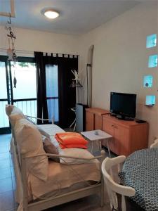 TV a/nebo společenská místnost v ubytování Blue Holidays Apartment
