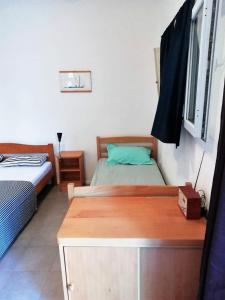 Postel nebo postele na pokoji v ubytování Blue Holidays Apartment