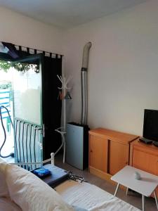TV a/nebo společenská místnost v ubytování Blue Holidays Apartment