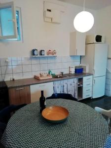 Kuchyň nebo kuchyňský kout v ubytování Blue Holidays Apartment