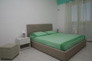 Posteľ alebo postele v izbe v ubytovaní B&B Torre Nave