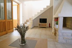 TV a/nebo společenská místnost v ubytování Beach Villa Olivia