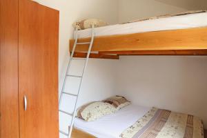Postel nebo postele na pokoji v ubytování Beach Villa Olivia