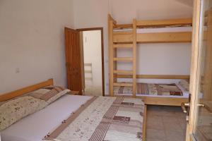 Postel nebo postele na pokoji v ubytování Beach Villa Olivia