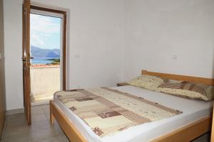 Postel nebo postele na pokoji v ubytování Beach Villa Olivia
