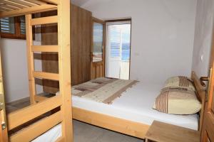Postel nebo postele na pokoji v ubytování Beach Villa Olivia