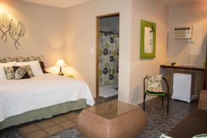 
A bed or beds in a room at Vista Canyon Inn
