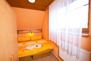 Posteľ alebo postele v izbe v ubytovaní Pension Rieger