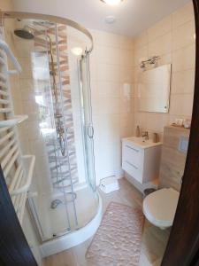 Koupelna v ubytování Apartamenty Aleksandria