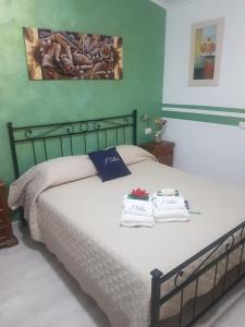 Postel nebo postele na pokoji v ubytování I Villini Affittacamere