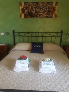 Postel nebo postele na pokoji v ubytování I Villini Affittacamere