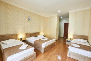 Katil atau katil-katil dalam bilik di Hotel Old Borjomi