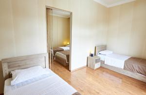 Katil atau katil-katil dalam bilik di Hotel Old Borjomi