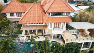 an aerial view of a house with an orange roof at Unique spacious luxury villa in Jimbaran