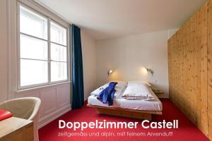 Letto o letti in una camera di Hotel Castell