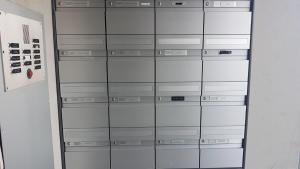 a stack of glass cabinets in a room at Stopoase in Bern