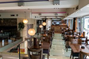 Restaurant o un lloc per menjar a Zam Residence