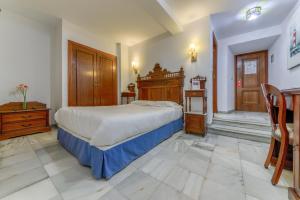 Postel nebo postele na pokoji v ubytování Hotel Playa de Regla