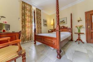 Postel nebo postele na pokoji v ubytování Hotel Playa de Regla