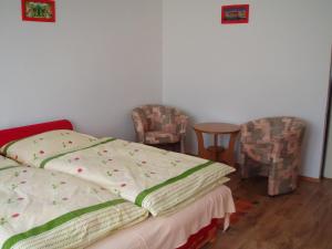 Posteľ alebo postele v izbe v ubytovaní Apartmany u Smreka