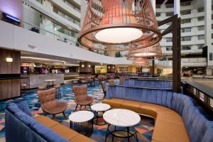 a lobby of a hotel with couches and tables at The Darling at The Star Gold Coast in Gold Coast
