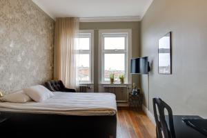 Letto o letti in una camera di Grand Hotel Jonkoping, BW Signature Collection