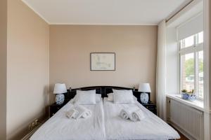 Letto o letti in una camera di Grand Hotel Jonkoping, BW Signature Collection