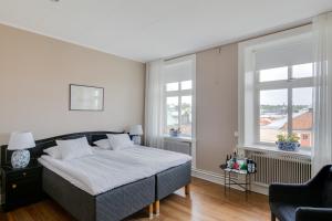 Letto o letti in una camera di Grand Hotel Jonkoping, BW Signature Collection
