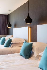 Postelja oz. postelje v sobi nastanitve C-Hotels Andromeda