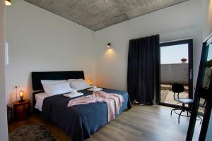 Postel nebo postele na pokoji v ubytování Villa Pietra