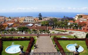 a view of the gardens of a resort at Hostel Tenerife in La Orotava