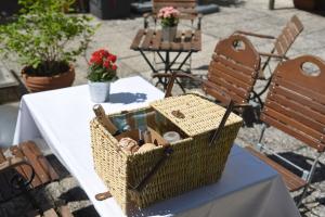a basket sitting on top of a table at Hotel Krone 1512 in Salzburg