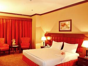 Postel nebo postele na pokoji v ubytování Grand Central Hotel