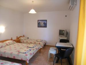Postel nebo postele na pokoji v ubytování Guest House "Tania"