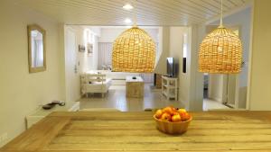 a room with a bowl of fruit on a table at Atlántico Boutique Hotel in Punta del Este
