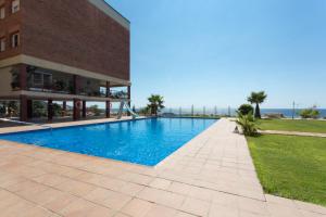 Bazén v ubytování Tranquilidad junto al mar con piscina nebo v jeho okolí
