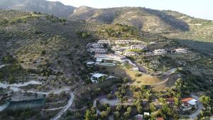 an aerial view of a village on a mountain at Holiday Lodge al Porto in Mattinata
