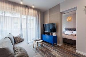 Posteľ alebo postele v izbe v ubytovaní City of The Kings Piano Apartment