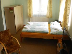 Postel nebo postele na pokoji v ubytování Apartman Kublovi