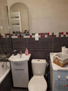 Kúpeľňa v ubytovaní Apartament Kinio